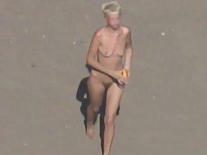 Dirty nudist girl on the beach Picture 8