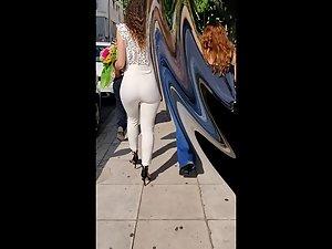 Curly chick's ass looks amazing in white pants Picture 7