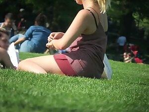 Upskirt while she rolls around on the grass Picture 5