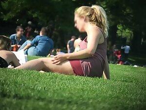 Upskirt while she rolls around on the grass Picture 7