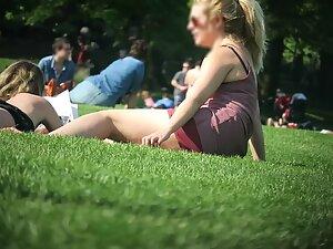 Upskirt while she rolls around on the grass Picture 8