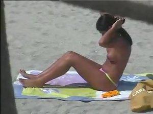 Spying a tanned topless babe Picture 6