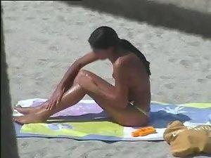 Spying a tanned topless babe Picture 8