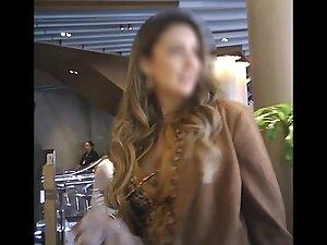 Upskirt of an expensive looking posh milf Picture 1