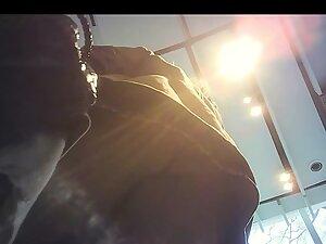Upskirt of an expensive looking posh milf Picture 2