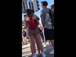 Big butt pops out of upskirt when she leans forward Picture 8
