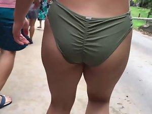 Oriental girl on her way to the beach