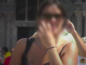 Upskirt of a crouching milf