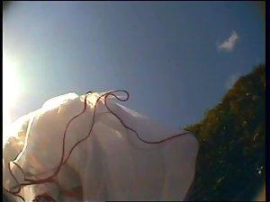 Bride acicdentally shows under gown Picture 3