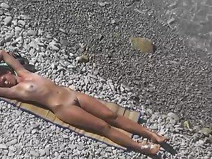 Perfect naked body examined on beach Picture 6