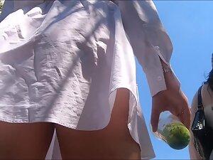 No panties discovered under short white dress Picture 5