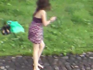 Zooming to view under her skirt Picture 2