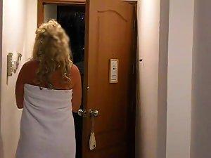 Naked milf drops the towel in front of him Picture 8