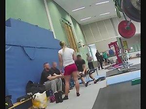 Sexy weightlifter girl during workout Picture 1