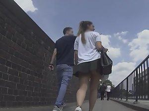 Upskirt of teen walking with boyfriend Picture 2