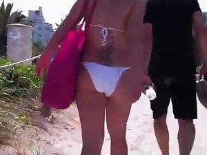 Checking out butts next to a beach Picture 2