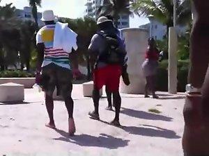 Checking out butts next to a beach Picture 3