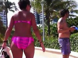 Checking out butts next to a beach Picture 5