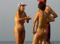 Nudists standing and chit chatting Picture 2
