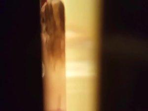 Peeping on naked sister while she dries her hair Picture 3