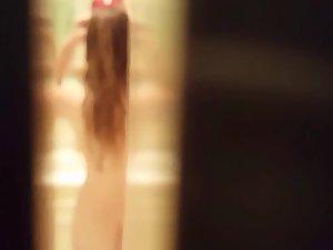Peeping on naked sister while she dries her hair Picture 4