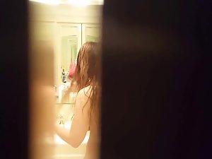 Peeping on naked sister while she dries her hair Picture 5