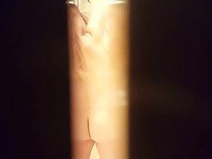 Peeping on naked sister while she dries her hair Picture 7