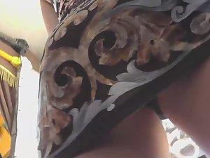 Upskirt of a hot girl with long golden hair Picture 1