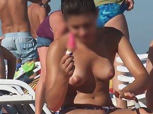 Topless chick eats an ice cream Picture 2