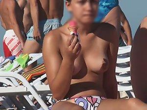 Topless chick eats an ice cream Picture 4