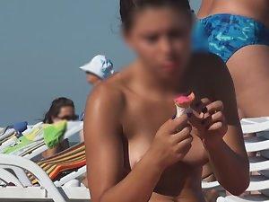 Topless chick eats an ice cream Picture 7