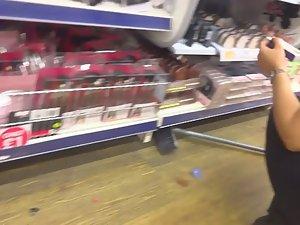 Store clerk bending over in front of me Picture 1