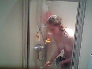 Spying on naked sister shaving her legs in shower Picture 3