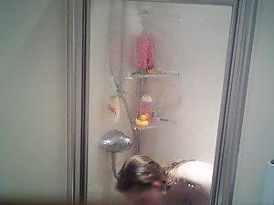 Spying on naked sister shaving her legs in shower Picture 5