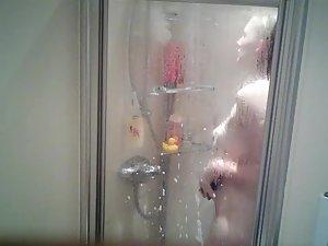 Spying on naked sister shaving her legs in shower Picture 6
