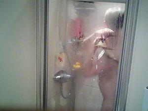 Spying on naked sister shaving her legs in shower Picture 7