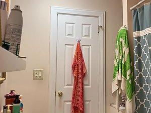 Spying on gorgeous roommate naked in bathroom Picture 2