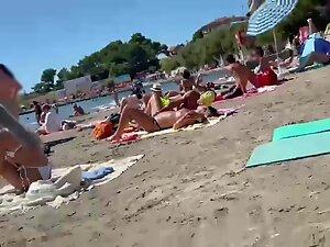 Making out while fingering her pussy on a public beach Picture 7