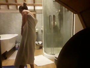 Peeping her naked in and out of shower Picture 6
