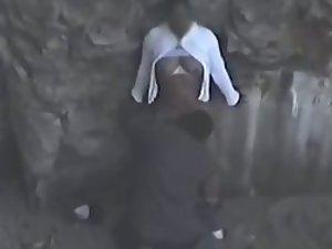 Guy fucks a black girl near rocks