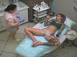 Tattooed vixen spied during hair removal treatment Picture 3
