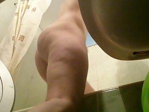 Shaved pussy caught by hidden cam in bathroom Picture 2