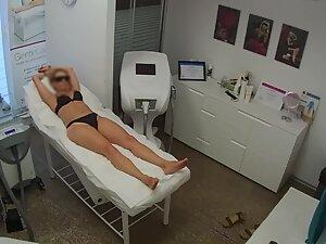 Spying on fancy woman getting naked for hair removal Picture 1