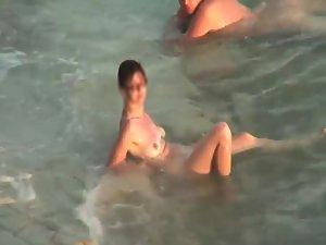 Sunburned woman is naked on a beach Picture 3