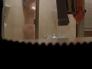Spying her naked body and tramp stamp tattoo in shower Picture 1