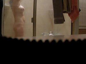 Spying her naked body and tramp stamp tattoo in shower Picture 4