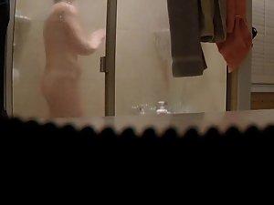 Spying her naked body and tramp stamp tattoo in shower Picture 8