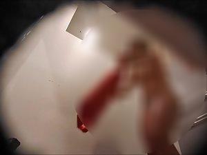 Fit girl with round fake tits in dressing room Picture 1