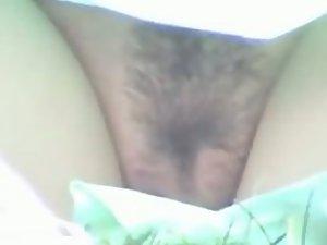 Neatly trimmed pussy caught in the park Picture 1