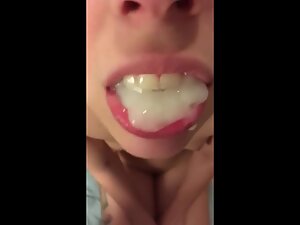 Wife's pretty mouth filled with lots of cum Picture 2